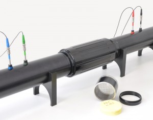 Compression specimen holder for impedance tube for measurement of sound absorption coefficient and transmission coefficient of compressed materials